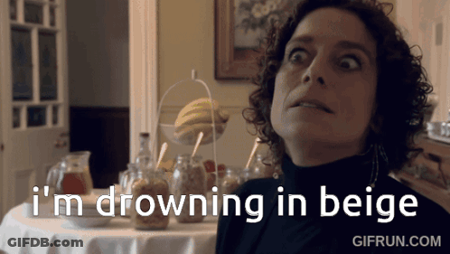 Woman Saying I'm Drowning In Beige At Table With Jars GIF