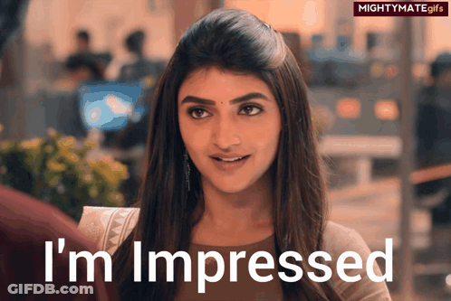 Woman Saying I'm Impressed GIF