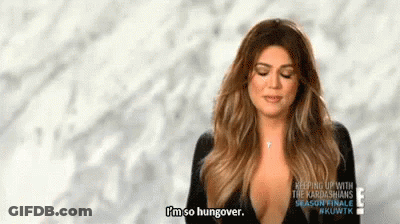 Woman Saying I'm So Hungover In Black Top GIF