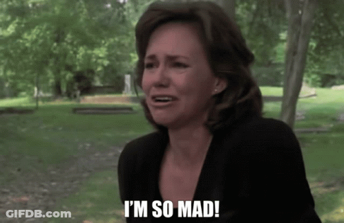 Woman Saying I'm So Mad In Front Of Graveyard GIF