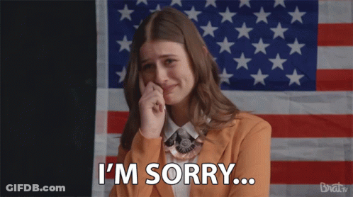 Woman Saying I'm Sorry With American Flag GIF