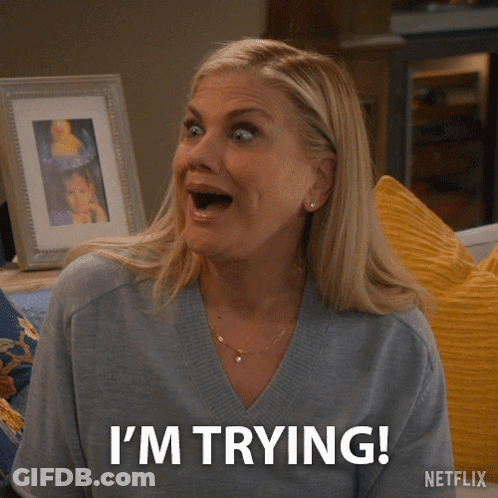 Woman Saying I'm Trying In Front Of Netflix GIF