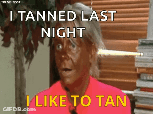 Woman Saying I Tanned Last Night GIF