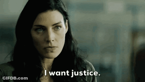 Woman Saying I Want Justice In Dark Room GIF