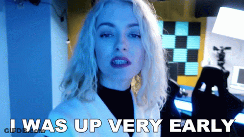 Woman Saying I Was Up Very Early Blue Background GIF