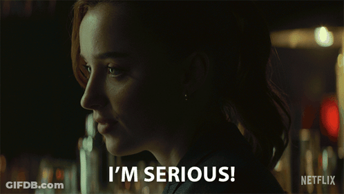 Woman Saying Im Serious In Dark Room GIF