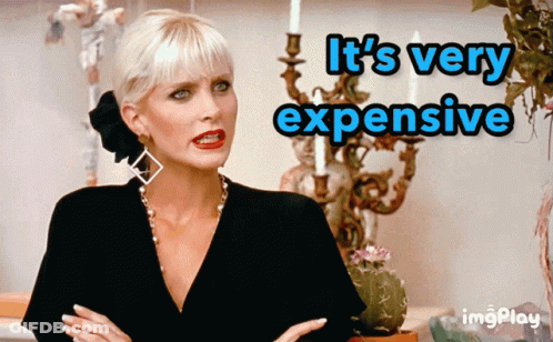 Woman Saying It's Very Expensive With Candle Holder GIF