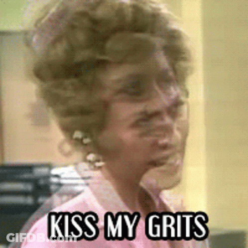 Woman Saying Kiss My Grits GIF