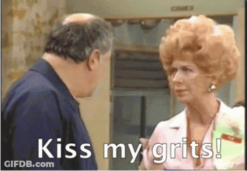 Woman Saying Kiss My Grits Next To Man GIF