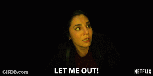 Woman Saying Let Me Out In Dark Room GIF