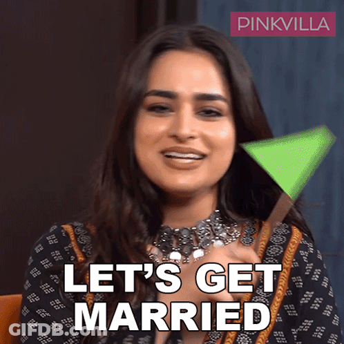 Woman Saying Let's Get Married Holding Green Object GIF