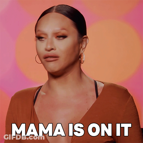 Woman Saying Mama In Front Of Orange GIF