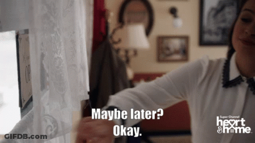 Woman Saying Maybe Later Okay At Super Channel Heart & Home Sign GIF