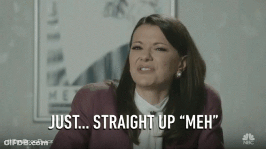 Woman Saying Meh GIF