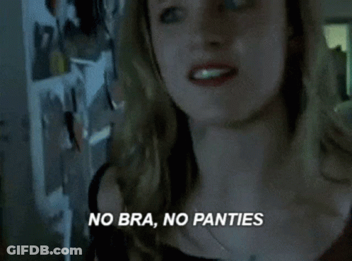 Woman Saying No Bra No Panties By Refrigerator GIF