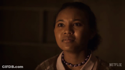 Woman Saying No In Dark Room GIF