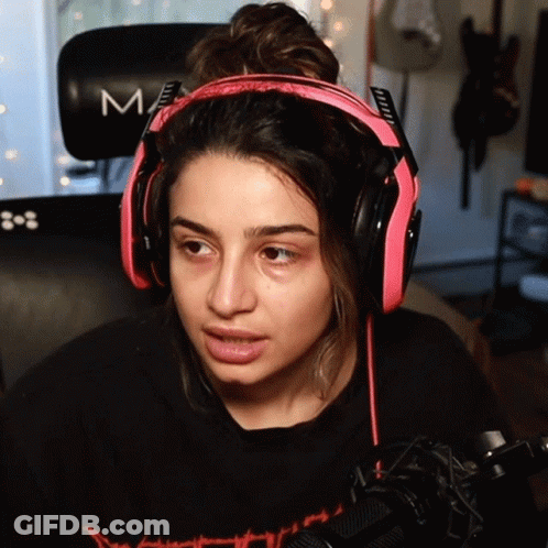 Woman Saying Nothing Matters In Front Of Car GIF