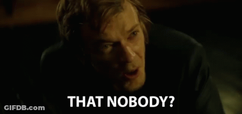 Woman Saying Ok I Am Nobody While Holding Baby GIF