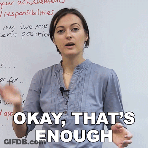 Woman Saying Okay That's Enough In Front Of Whiteboard GIF