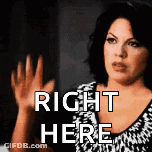 Woman Saying Right Here With Hands Up GIF