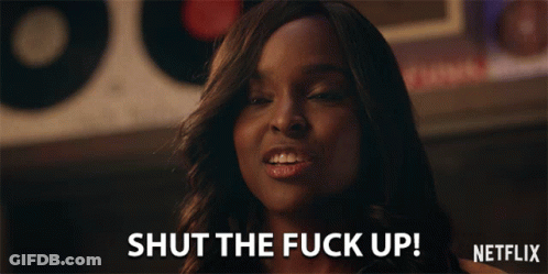 Woman Saying Shut The Fuck Up In Front Of Netflix Sign GIF