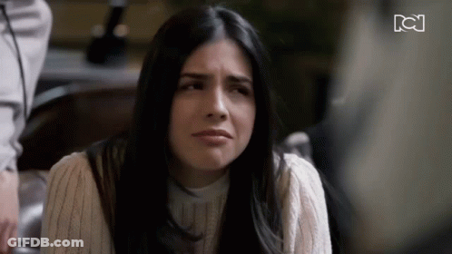 Woman Saying So You Love It In Front Of Framed Pictures GIF