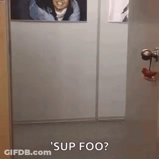 Woman Saying Sup Foo In Hallway GIF