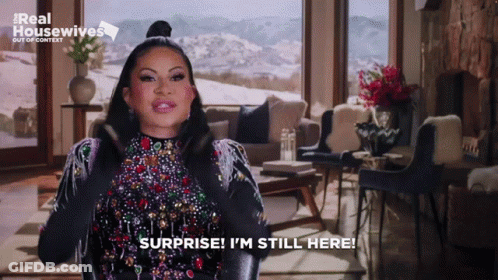 Woman Saying Surprise I'm Still Here GIF