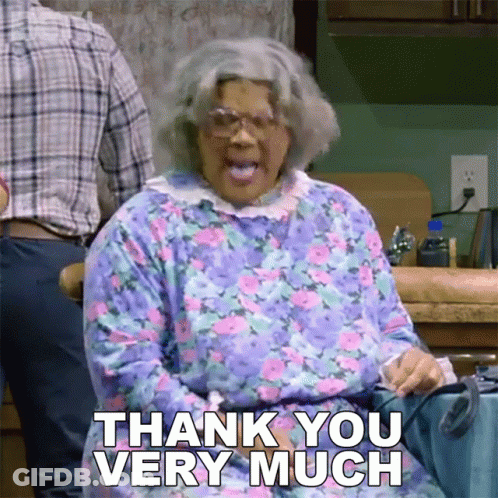 Woman Saying Thank You Very Much In Kitchen GIF