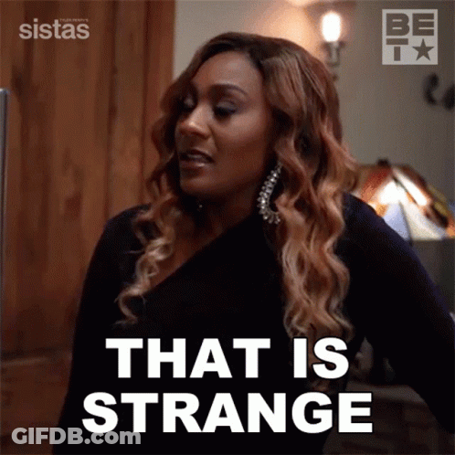 Woman Saying That Is Strange By Lamp GIF