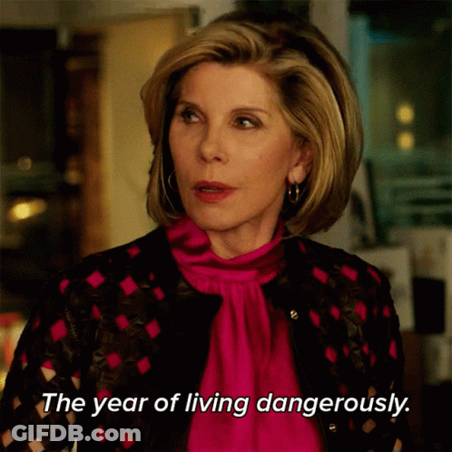 Woman Saying The Year Of Living Dangerously In Pink Shirt GIF