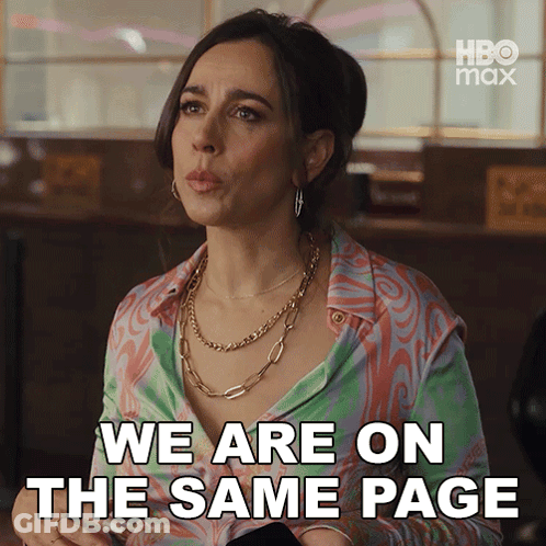 Woman Saying We Are On The Same Page In Colorful Shirt GIF