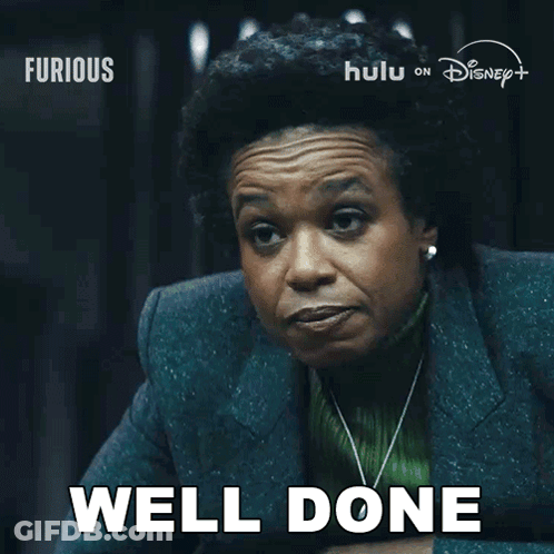 Woman Saying Well Done In Front Of Disney Poster GIF