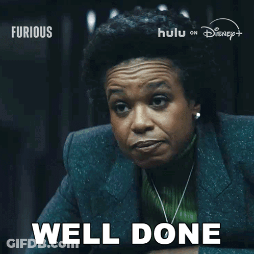 Woman Saying Well Done In Front Of Disney Poster GIF