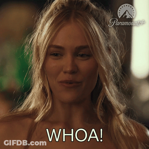 Woman Saying Whoa In Front Of Paramount Sign GIF