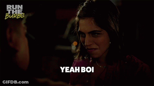 Woman Saying Yeah Boi In Front Of Run The Burbs Poster GIF