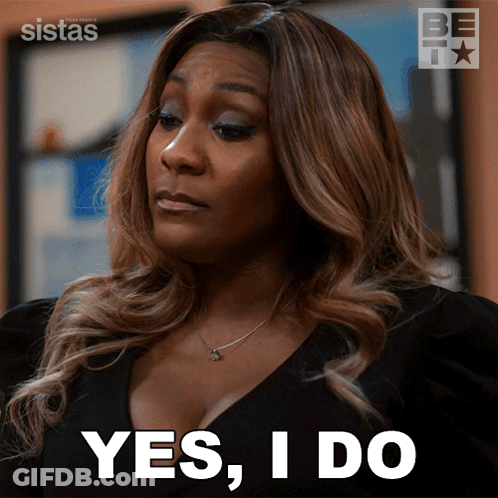 Woman Saying Yes In Front Of Sistas Sign GIF