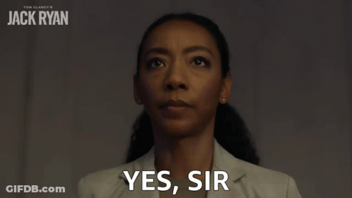 Woman Saying Yes Sir Beside Jack Ryan Poster GIF