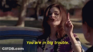 Woman Saying You Are In Big Trouble While Pointing Up GIF