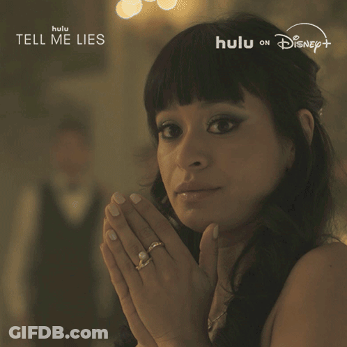 Woman Saying Yup In Front Of Tell Me Lies Sign GIF