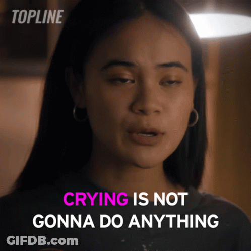 Woman Says Crying Is Not Gonna Do Anything In Pink Letters GIF