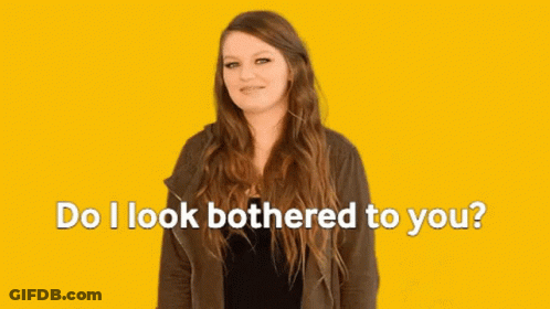 Woman Says Do I Look Bothered To You On Yellow Background GIF