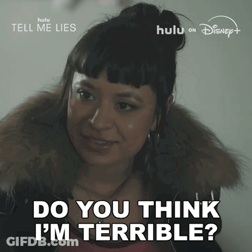 Woman Says Do You Think I'm Terrible In Front Of Tell Me Lies Sign GIF
