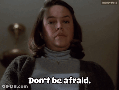 Woman Says Don't Be Afraid In Front Of Lamp GIF