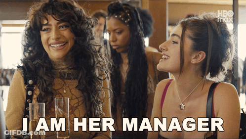 Woman Says I Am Her Manager Holding Champagne Glasses GIF
