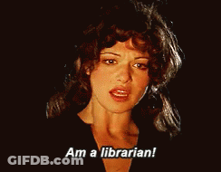 Woman Says I Am Librarian In Dark Room GIF