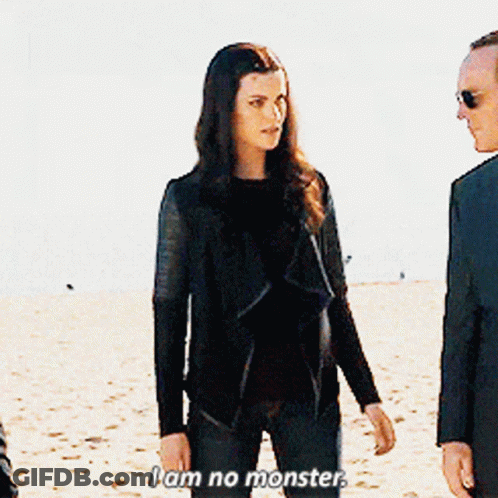 Woman Says I Am No Monster In Front Of Man In Suit GIF