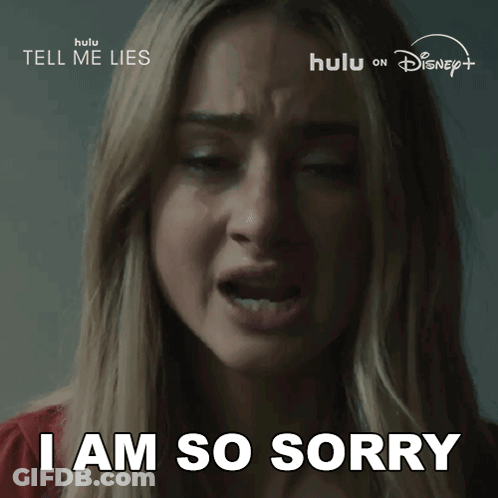 Woman Says I Am So Sorry In Front Of Tell Me Lies Sign GIF