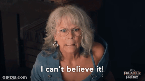 Woman Says I Can't Believe It In Front Of Freakier Friday Poster GIF