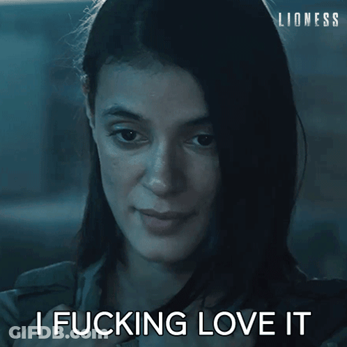 Woman Says I Fucking Love It In Front Of Lioness Logo GIF
